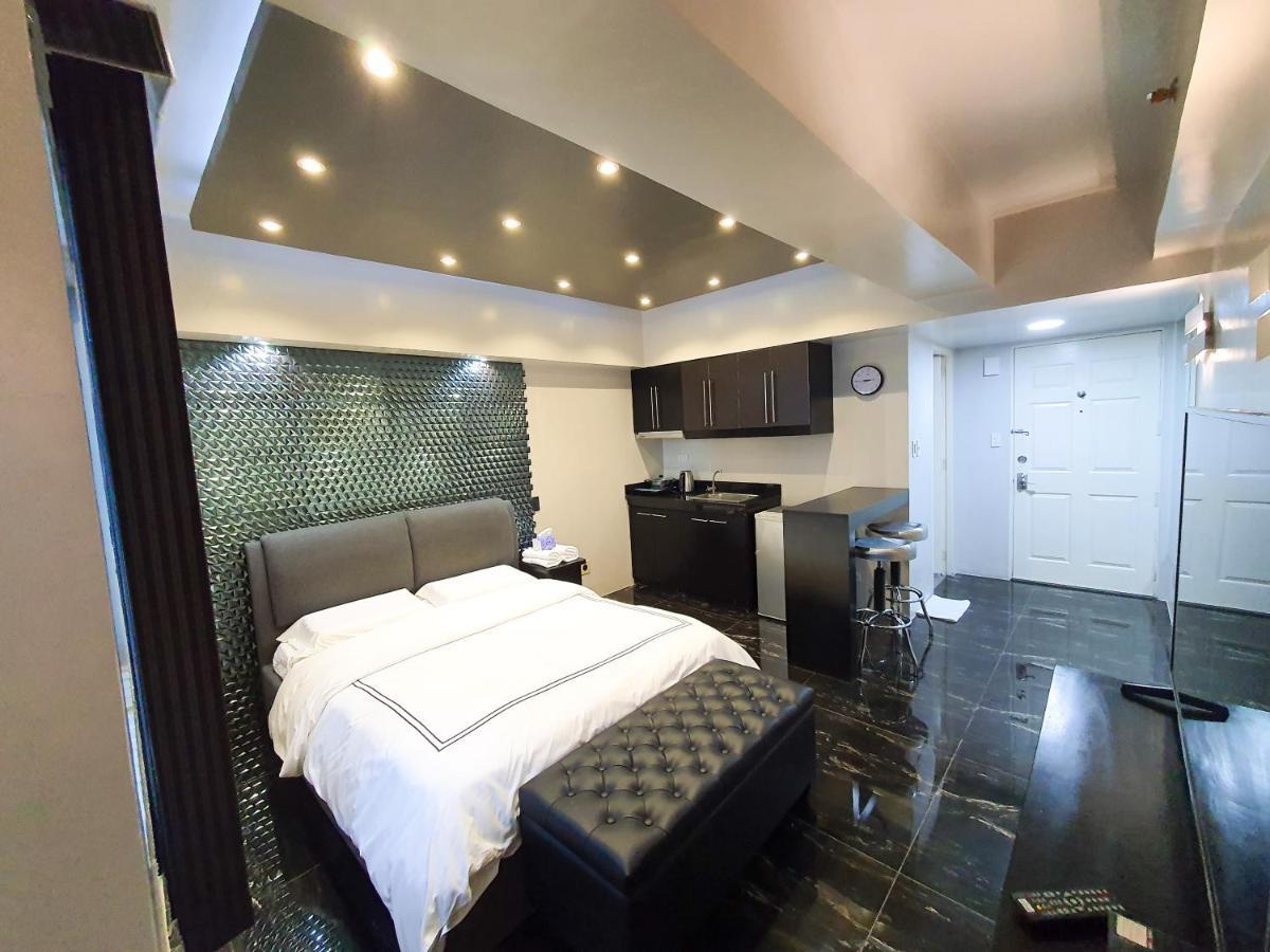 Burgundy Mckinley Place Service Apartment مانيلا المظهر الخارجي الصورة