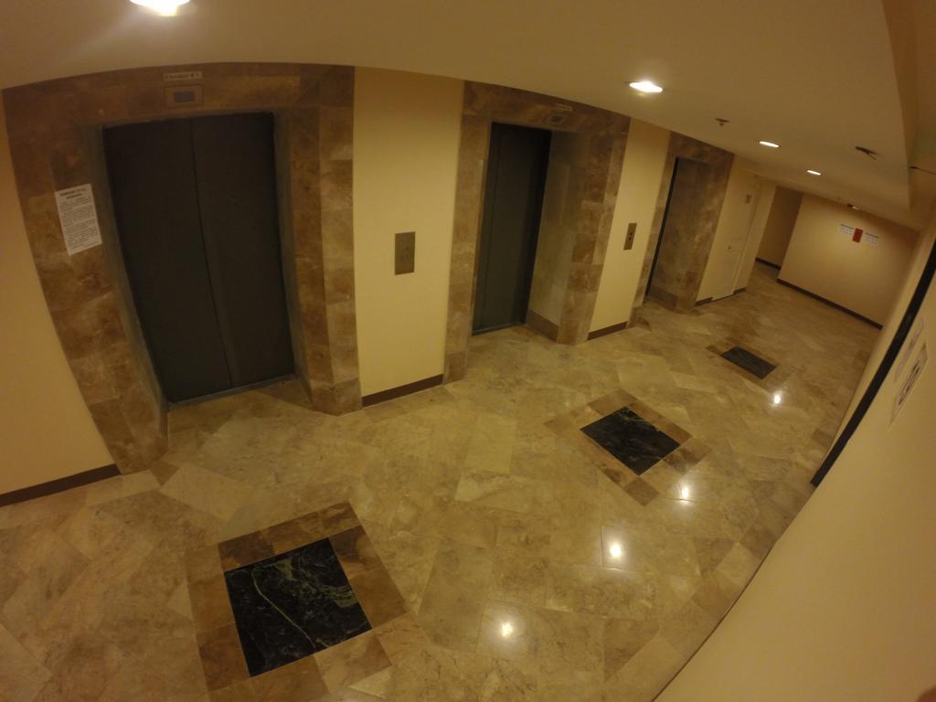 Burgundy Mckinley Place Service Apartment مانيلا المظهر الخارجي الصورة
