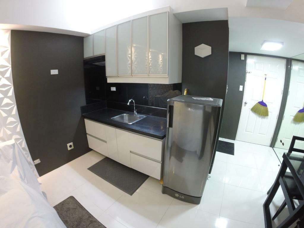 Burgundy Mckinley Place Service Apartment مانيلا المظهر الخارجي الصورة