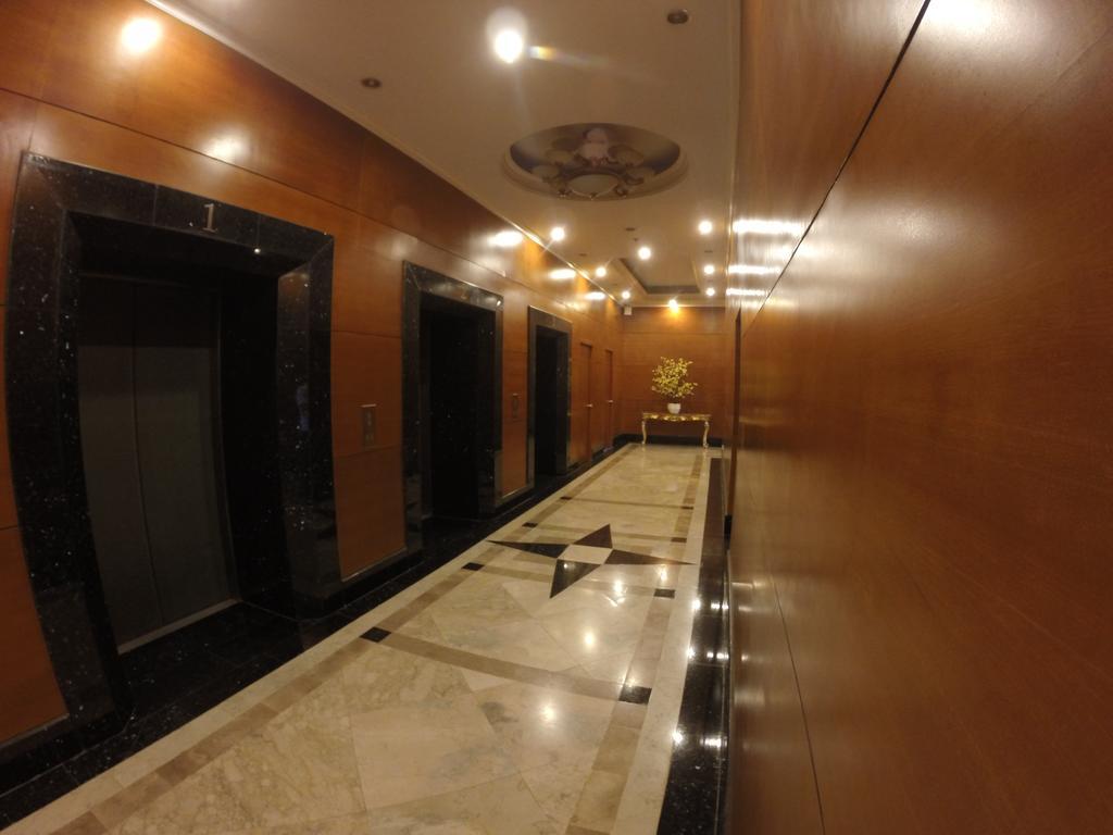 Burgundy Mckinley Place Service Apartment مانيلا المظهر الخارجي الصورة