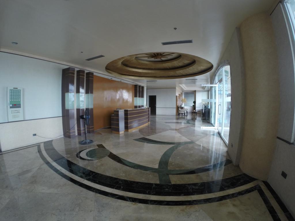Burgundy Mckinley Place Service Apartment مانيلا المظهر الخارجي الصورة